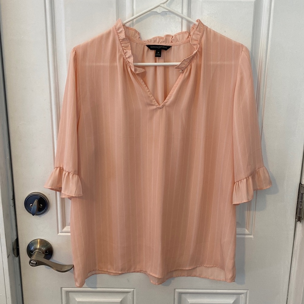 Coral and white striped blouse